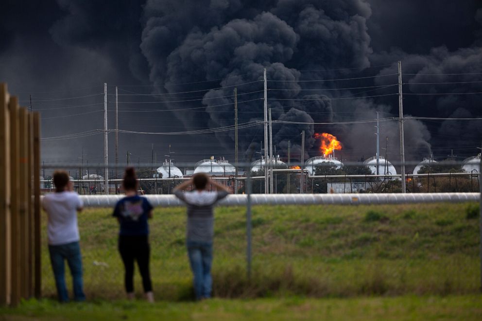 PHOTO: Residents observe the fire consuming the TPC Group plant, Nov. 27, 2019, in Port Neches, Texas.  