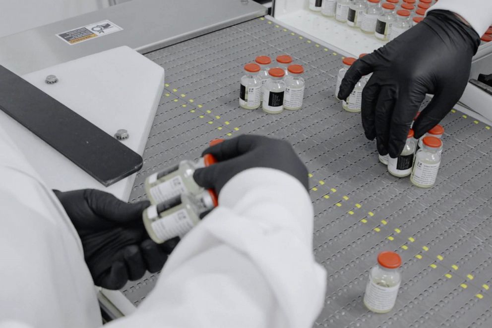 PHOTO: In this undated image from video provided by Regeneron Pharmaceuticals on Oct. 2, 2020, vials are inspected at the company's facilities in New York state, for efforts on an experimental coronavirus antibody drug.