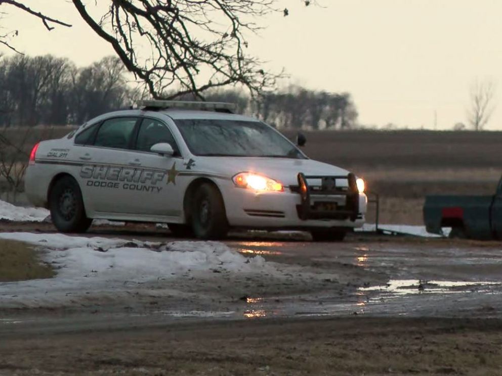 Dodge County sheriffs investigate the scene outside Lois Reiss home in Blooming Prairie, Minnesota, on March 23, 2018. Reiss is suspected in the murder of her husband, David.