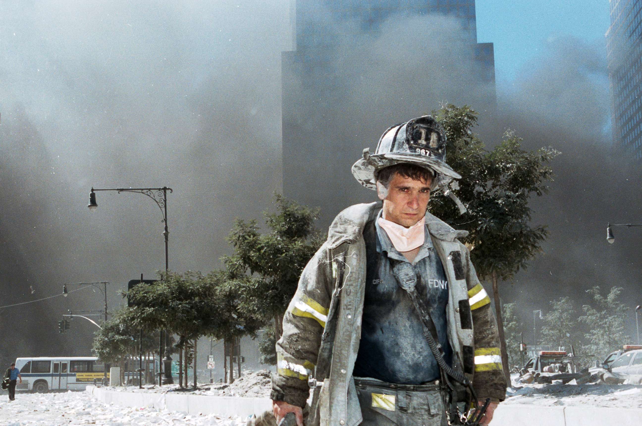 PHOTO: An unidentified New York City firefighter walks away from Ground Zero after the collapse of the Twin Towers, Sept. 11, 2001, in New York.