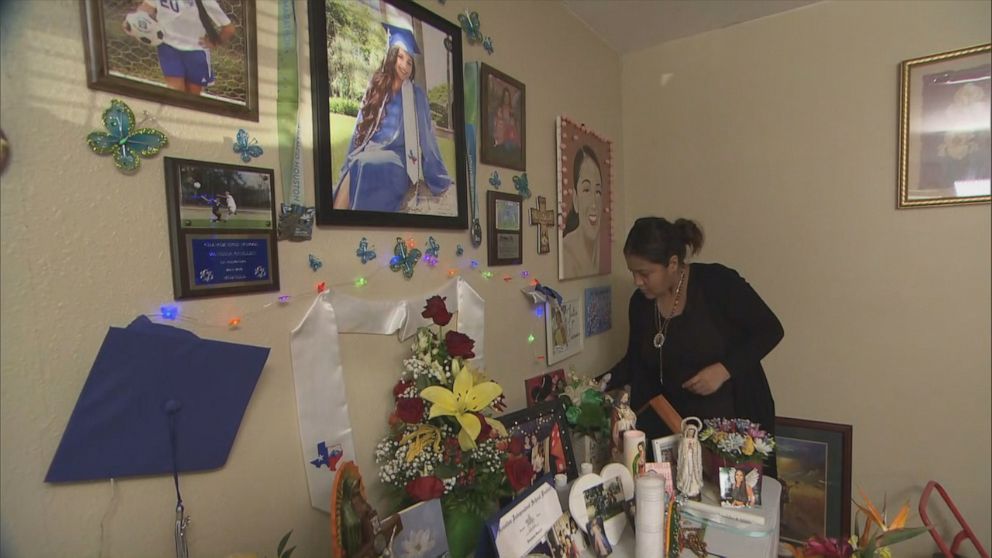 PHOTO: Gloria Guillen attends to a small memorial to Vanessa in the family's home.