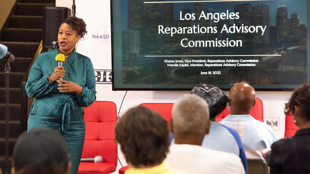 PHOTO: Khansa Jones-Muhammad, the vice president of the Los Angeles Reparations Advisory Commission, addresses the crowd at a community listening session at the Pullman Community Art Center in Los Angeles on July 19th, 2022.
