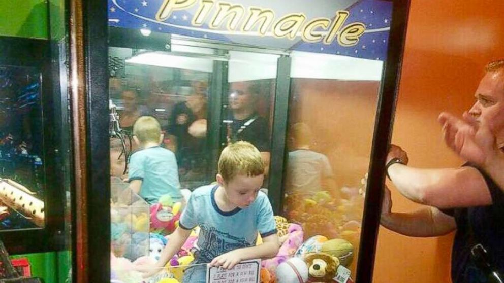 PHOTO: A young boy named Mason got stuck inside a claw machine and had to be rescued by firefighters.
