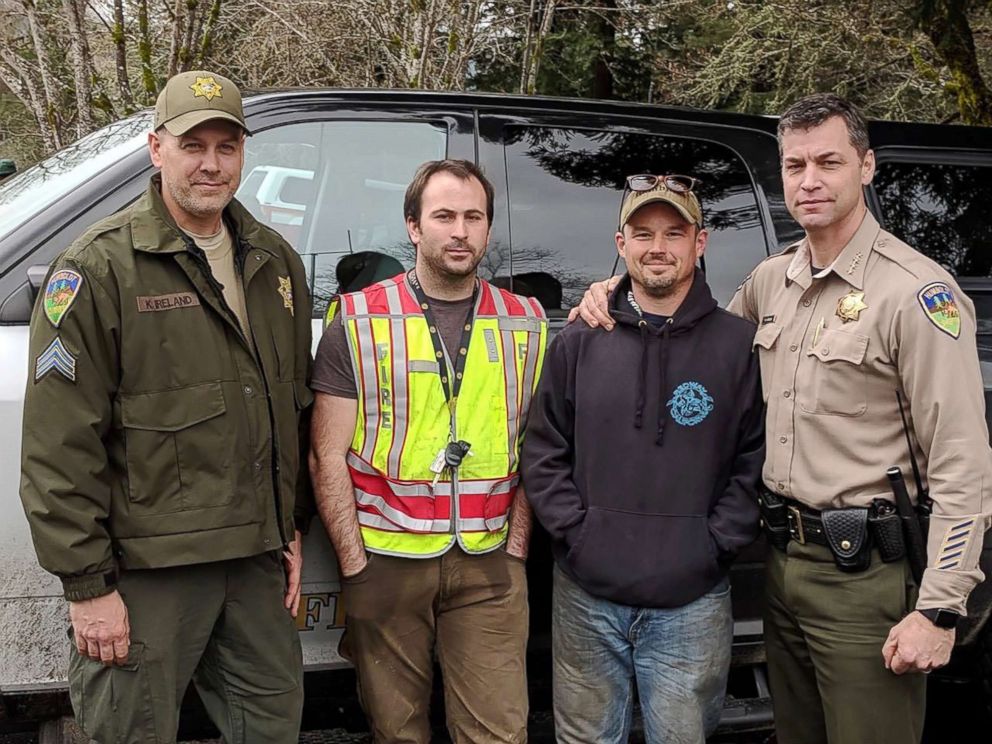 PHOTO: From left, Humboldt County Sheriff Sgt. Kerry Ireland, Piercy, California, Firefighter  Abram Hill, Piercy Fire Chief Chumley and Humboldt County Sheriff William Honsal. Hill and Chumley found two missing sister lost in the forest on Sunday.