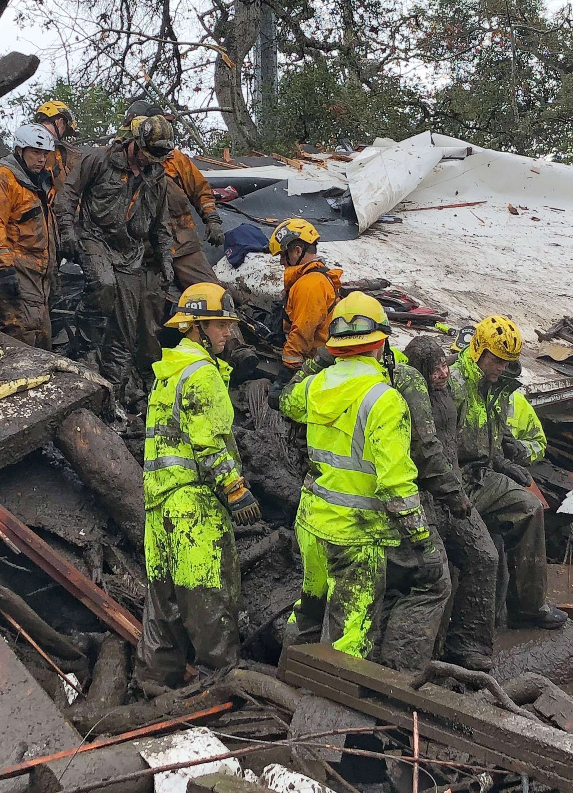 PHOTO: Firefighters rescue a 14-year-old girl trapped inside a destroyed home during heavy rains in Montecito, Calif., Jan. 9, 2018. Heavy rains overnight combined with large areas burned by the Thomas Fire combined for flash flooding and mudslide risk. 