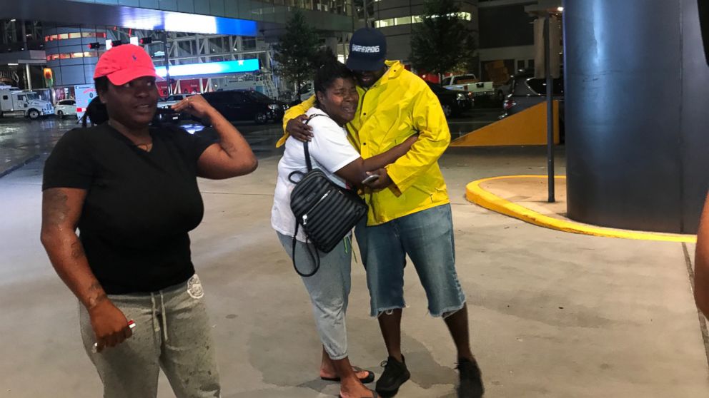 Iashia Nelson, who was stranded on the roof of a neighbor's two-story home with family members and neighbors, was reunited with James Murphy, the stranger who came to their rescue.