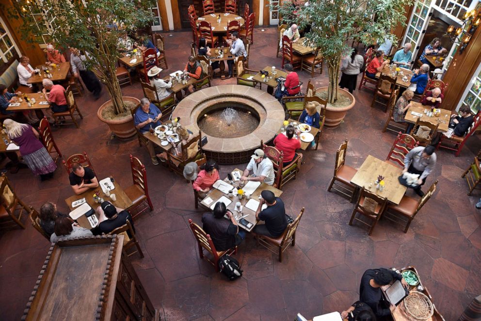 PHOTO: Diners eat lunch at La Plazuela restaurant in the historic La Fonda Hotel in Santa Fe, N.M., Aug. 17, 2019.