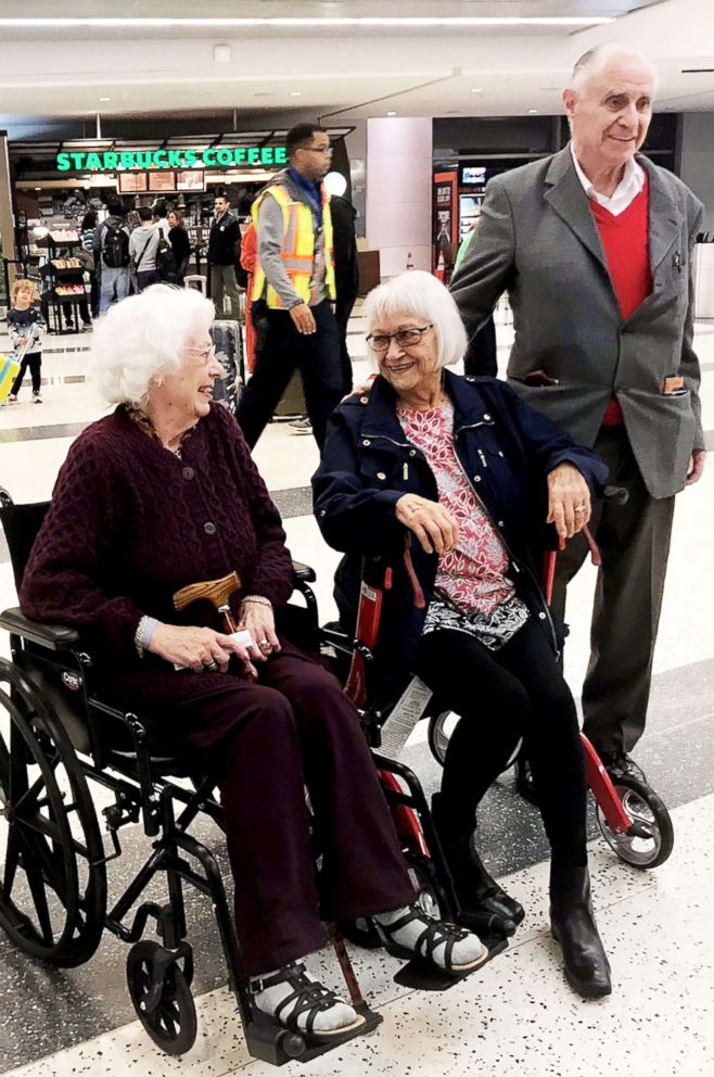 PHOTO: Una Pereira, John Davis, and Mary Winifred Meloy leaving the airport.