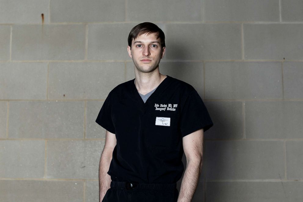 PHOTO:Dr. Kyle Fischer, 35, an emergency medicine doctor who is caring for COVID-19 patients, poses for a photograph after a 12-hour shift, outside the hospital where he works, during the coronavirus disease outbreak, Md., April 10, 2020.