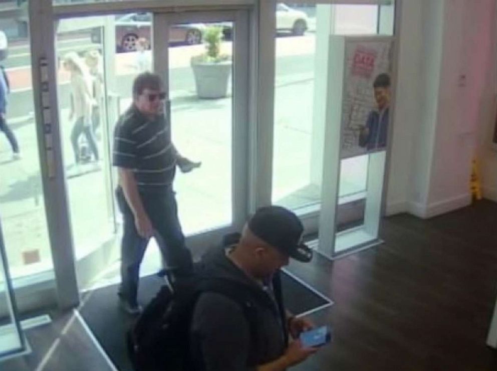 PHOTO: In this image released by the Suffolk County District Attorney's Office, Rex Heuermann is shown entering a cell phone store.