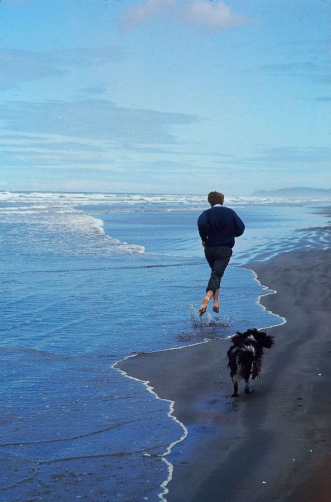 PHOTO: Presidential candidate Bobby Kennedy and his dog, Freckles, running on Fort Stevens State Park in Oregon, May 24, 1968.