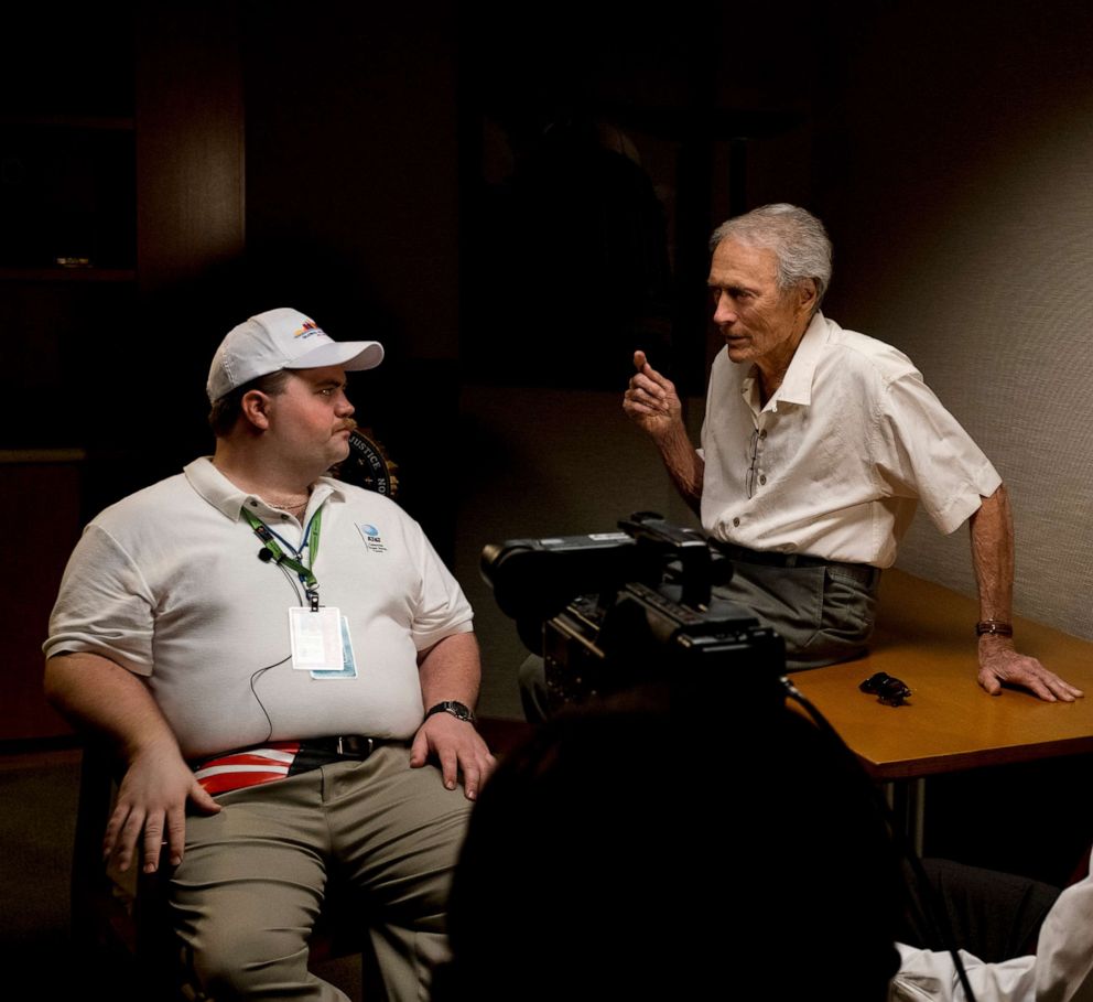 PHOTO: Paul Walter Hauser talks to Clint Eastwood on the set of the Warner Bros. film, "Richard Jewell."