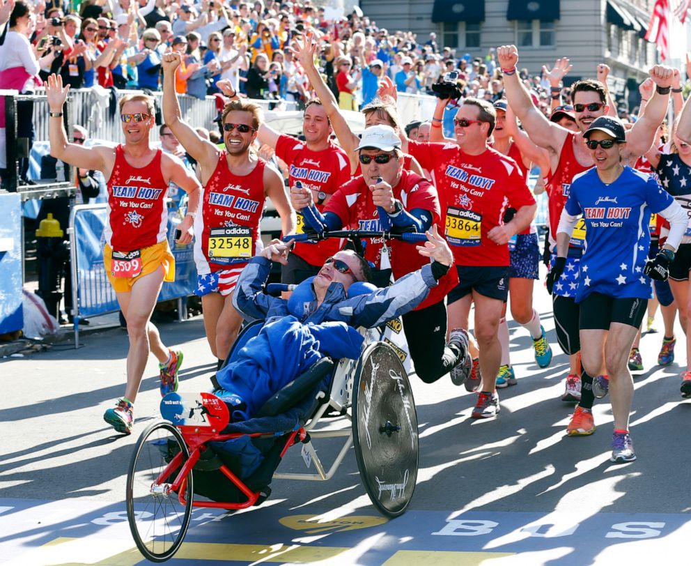 PHOTO: Dick and Rick Hoyt cross the finish line of the Boston Marathon with Team Hoyt on April 21, 2014.