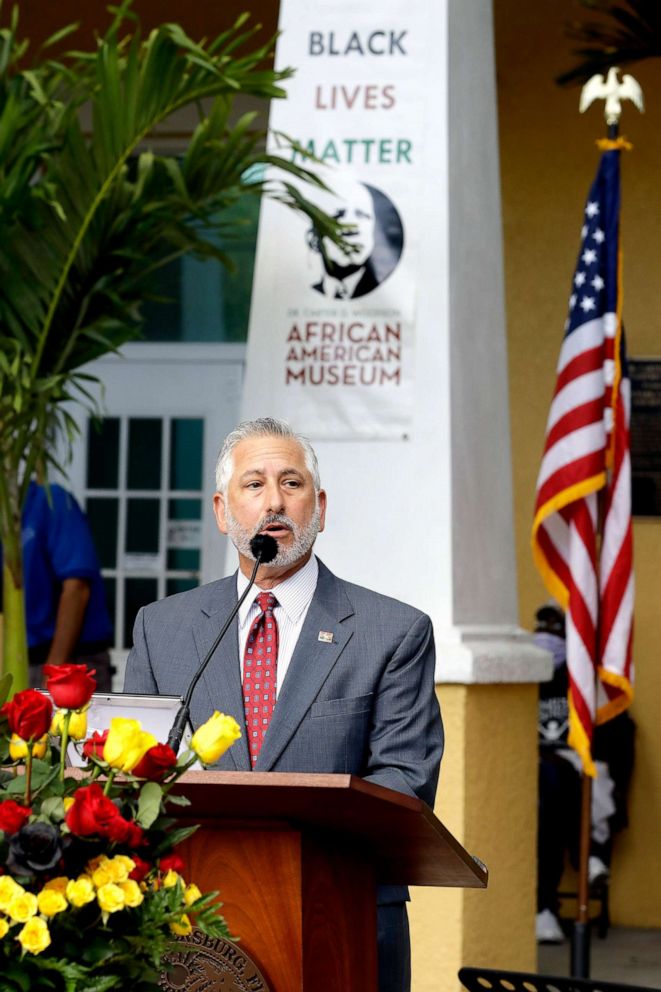 PHOTO: St. Petersburg, Fla., mayor Rick Kriseman reads a proclamation during a Juneteenth 2020 celebration outside the Dr. Carter G. Woodson African American Museum, in St. Petersburg, Fla., June 19, 2020.