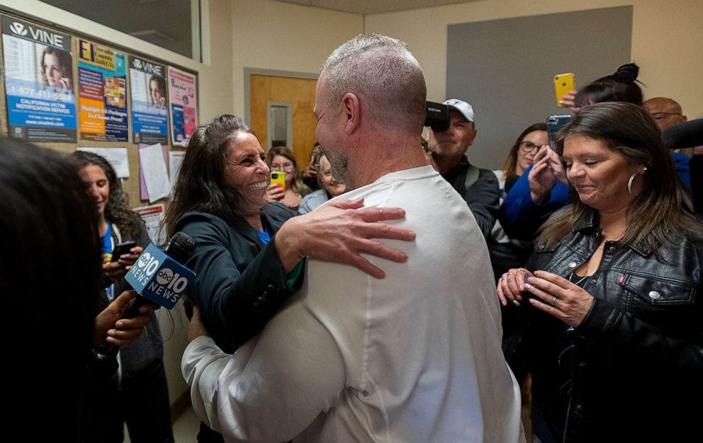 PHOTO: Ricky Davis is released from custody and hugs attorney Melissa O'Connell of the Innocence Project at the El Dorado County Jail, Feb 13, 2020 in Placerville, Calif., after he was found innocent in the 1985 cold case murder of Jane Hylton.