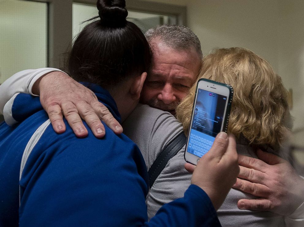 PHOTO: Ricky Davis is released from custody and hugs mom, Maureen Klein, right, and another family member at the El Dorado County Jail after he was exonerated in the 1985 murder of Jane Hylton on Feb. 13, 2020.