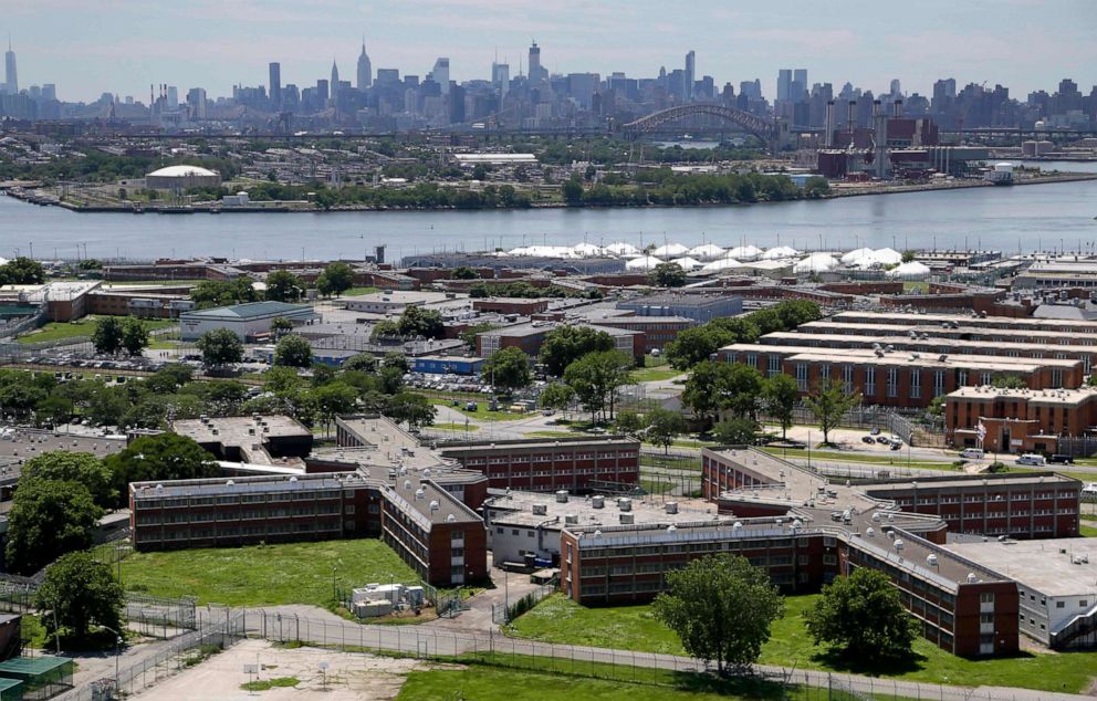 PHOTO: In this June 20, 2014, file photo, the Rikers Island jail complex stands in New York is shown with the Manhattan skyline in the background.
