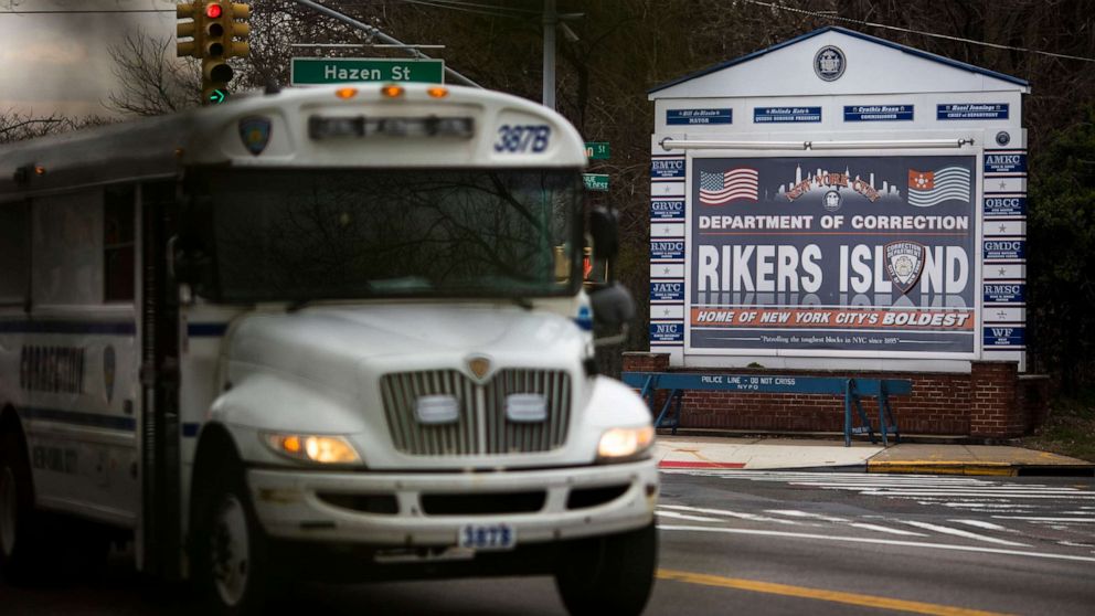 PHOTO: A bus passes the entrance to the Rikers Island jail complex in New York, March 20, 2020.