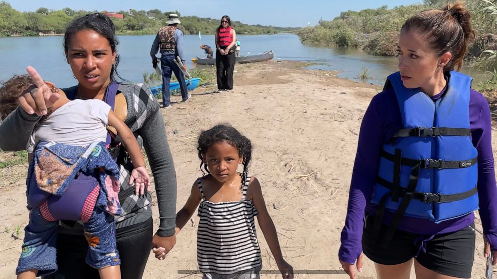 PHOTO: Migrants cross the Rio Grande in Eagle Pass, Texas, Aug. 1, 2023.