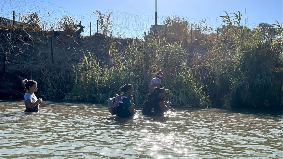PHOTO: Migrants cross the Rio Grande in Eagle Pass, Texas, Aug.1, 2023.