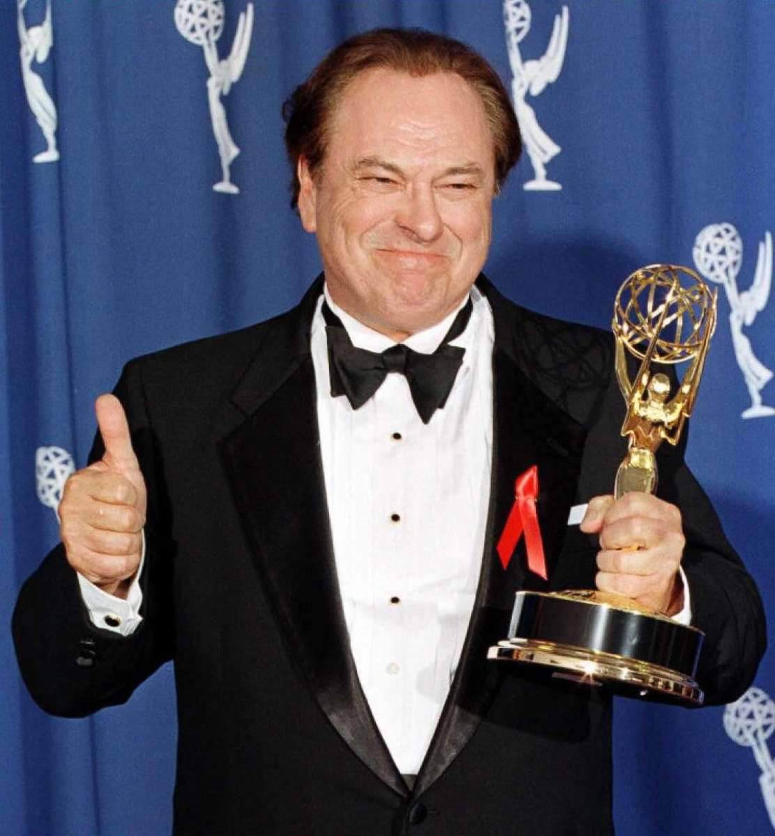 PHOTO: Actor Rip Torn gives the thumbs up as he holds his Emmy Award for Outstanding Supporting Actor in a Comedy Series for his role as Arthur on the "The Larry Sanders Show" at the 48th Annual Primetime Emmy Awards on Sept. 8, 2996, in Pasadena, Calif.