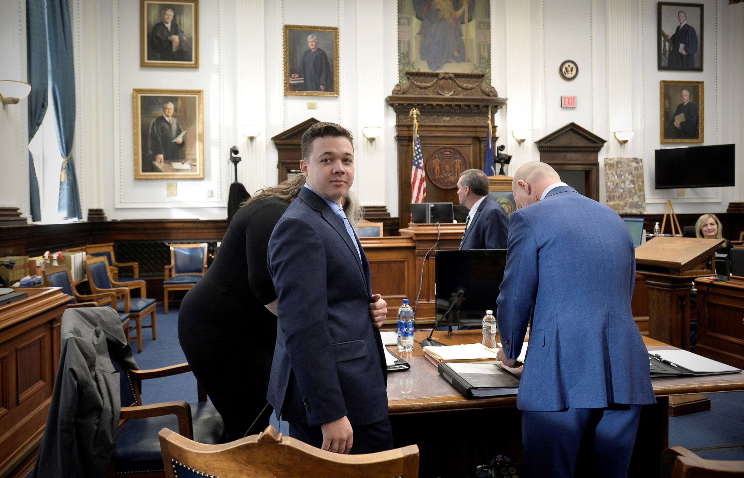 PHOTO: Kyle Rittenhouse, makes his way to his seat at the beginning of the day of his trial at the Kenosha County Courthouse on Nov. 15, 2021 in Kenosha, Wis. 