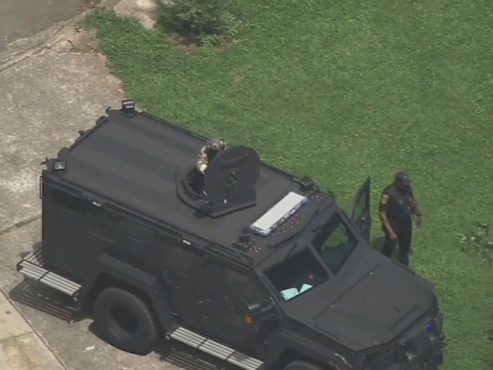 A DeKalb County, Georgia, SWAT team stormed a house in an Atlanta suburb on July 22, 2019, and arrested a 23-year-old man suspected of being involved in the shooting a Good Samaritan who tried to break up a road rage confrontation. PHOTO: