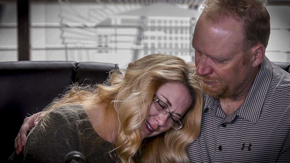 PHOTO: Kerrie Harter leans onto her husband Mike Harter, parents of Cody Harter, to sob as they speak during a press conference, May 6, 2018, in the lobby of Lee's Summit police headquarters in Lee's Summit, Mo.