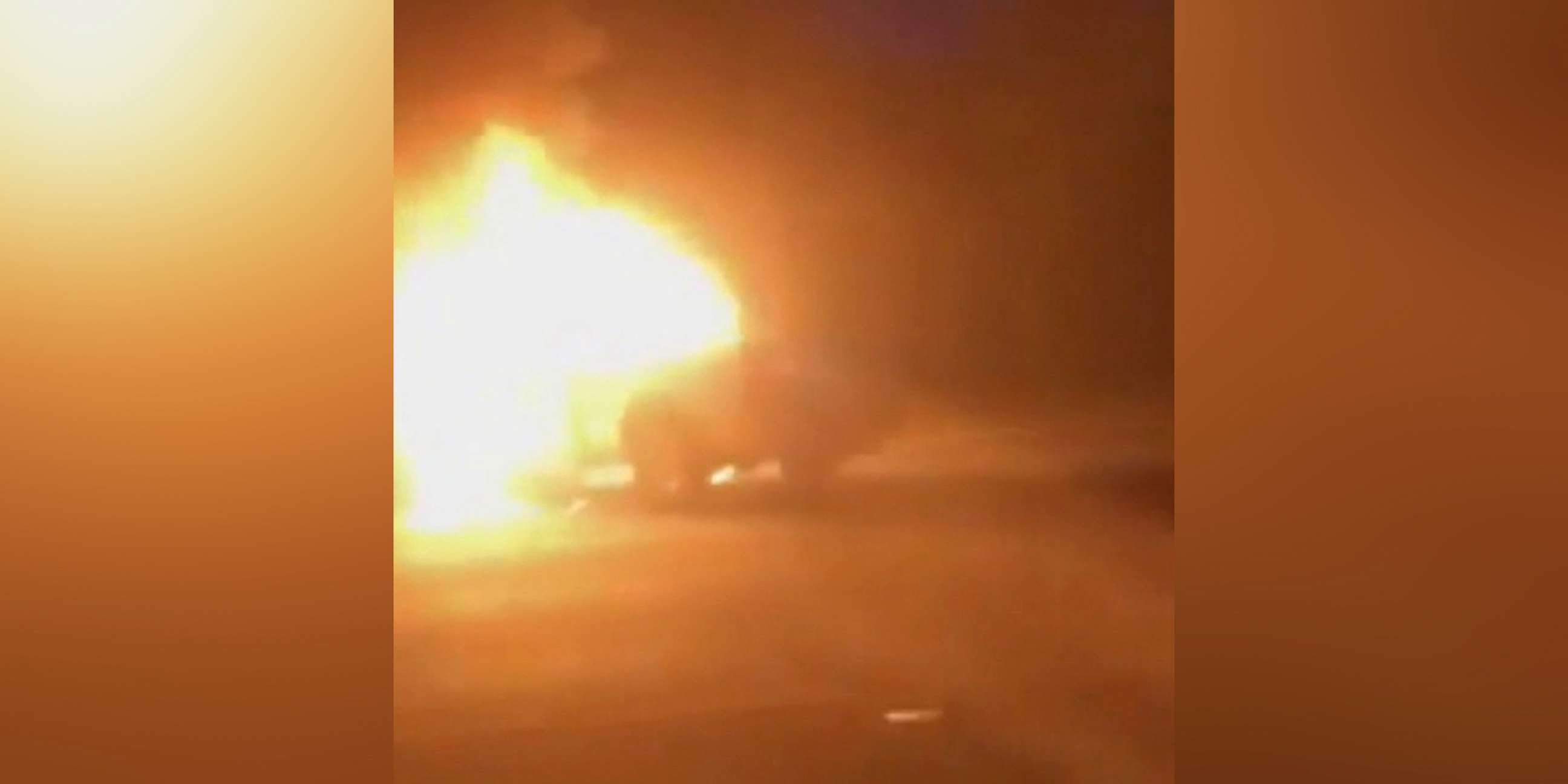 PHOTO: An image made from video shows a car burning after a road rage incident in Houston, July 4, 2019.