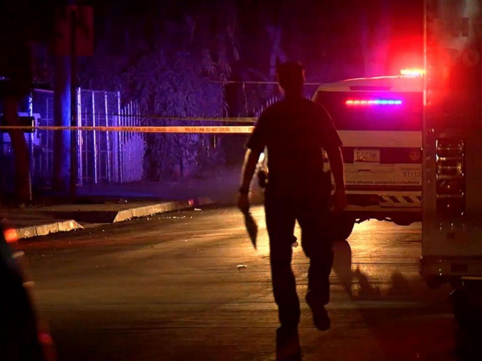 PHOTO: Police at the scene of a shooting in Phoenix, Ariz, April 3, 2019, following an apparent road rage shooting which killed a 10-year-old girl and injured her father.