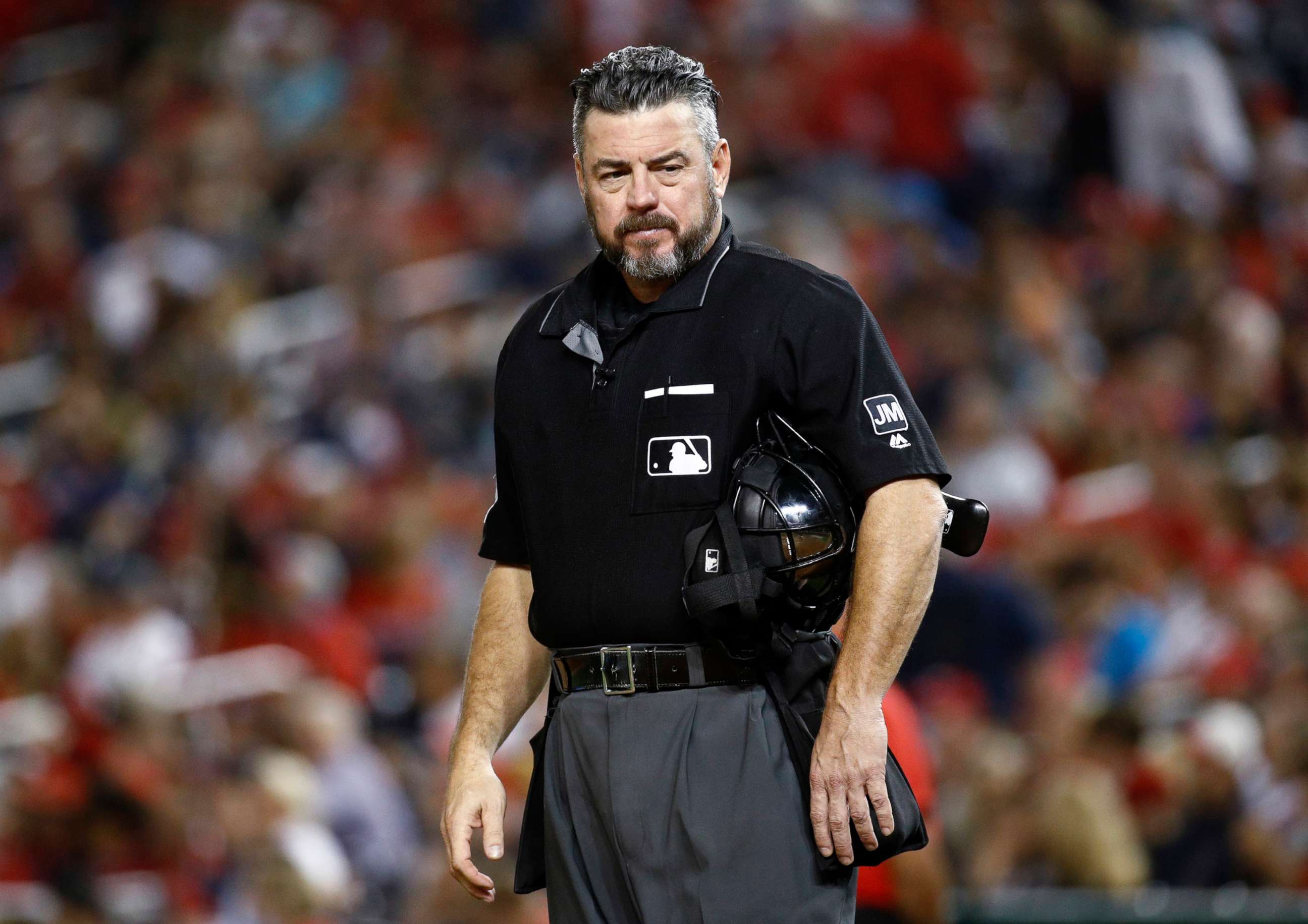 PHOTO: Umpire Rob Drake stands on the field during a baseball game between the Atlanta Braves and the Washington Nationals in Washington,Sept. 13, 2019.