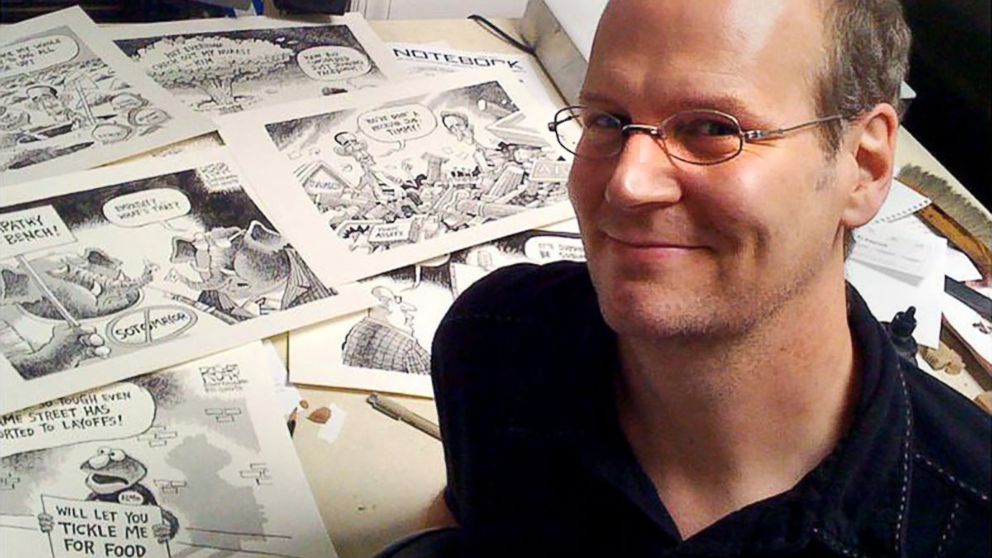 PHOTO: Cartoonist Rob Rogers poses for a photo in his studio in Pittsburgh, 2009.