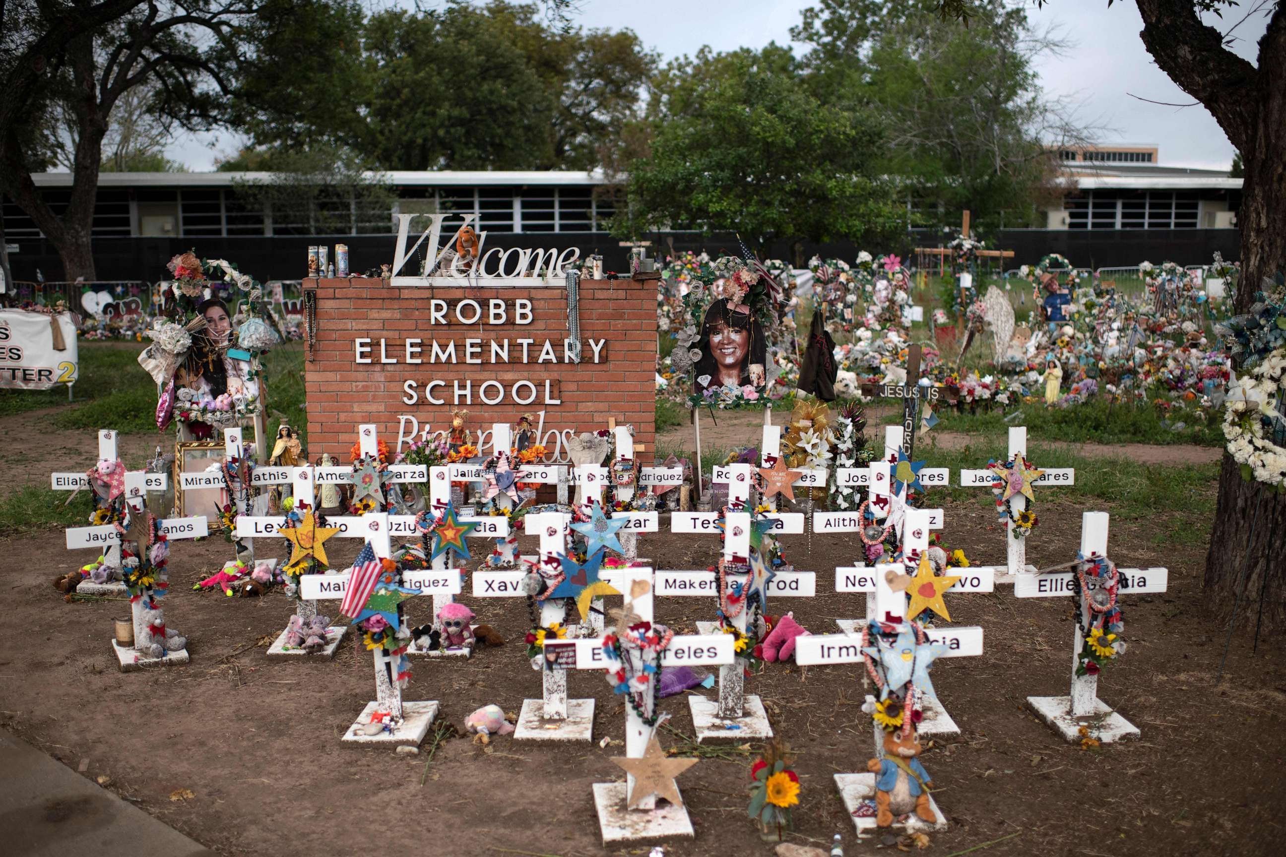PHOTO: Crosses set up to honor those who lost their lives during the Robb Elementary School shooting in Uvalde, Texas on November 8, 2022.