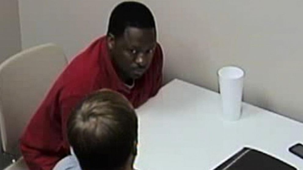 PHOTO: Investigators interview Robert Marks in connection with Lyntell Washington and her unborn child.