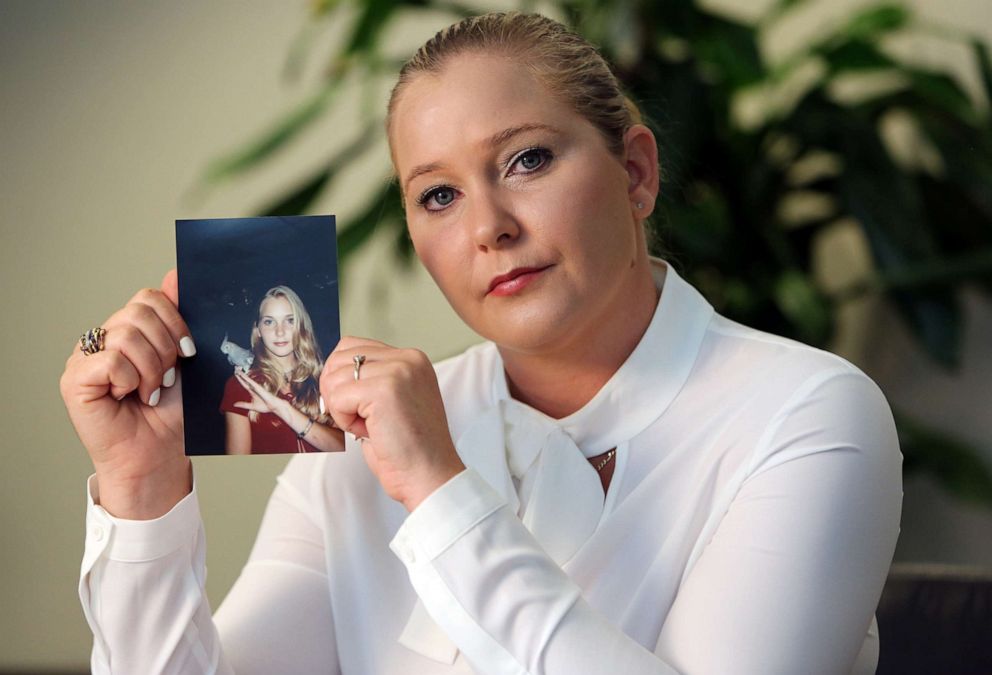 PHOTO: Virginia Roberts holds a photo of herself at age 16, when she says Palm Beach multimillionaire Jeffrey Epstein began abusing her sexually.