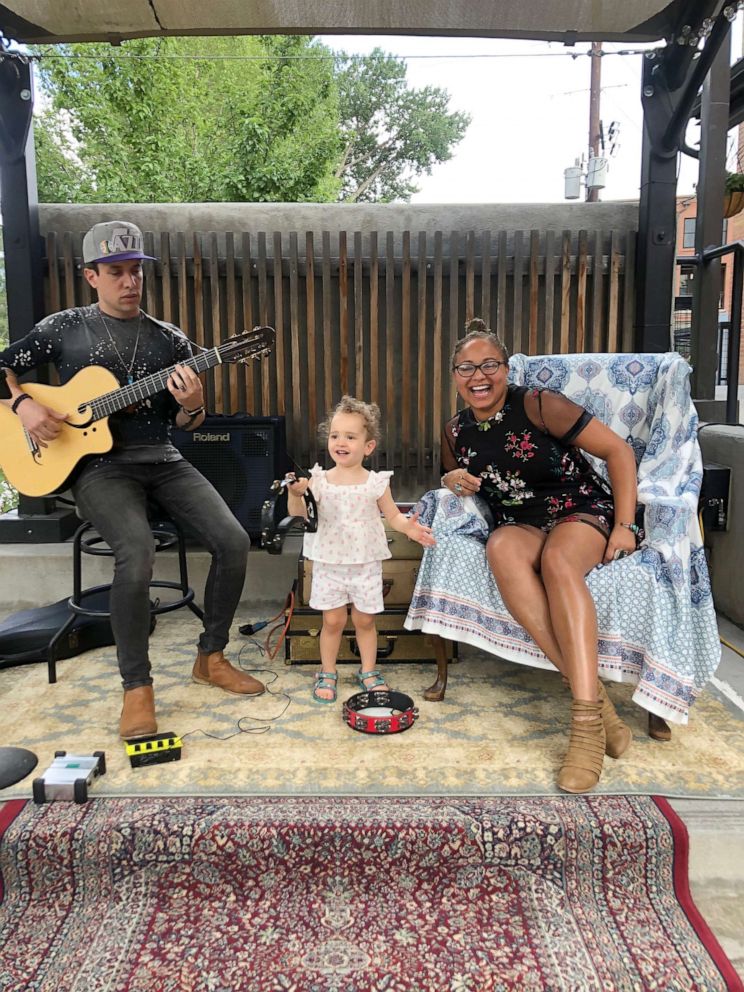 PHOTO: Robin Barnes Casey, her husband Pat Casey and their daughter Riley are pictured in Salida, Colo. during a performance in 2021.