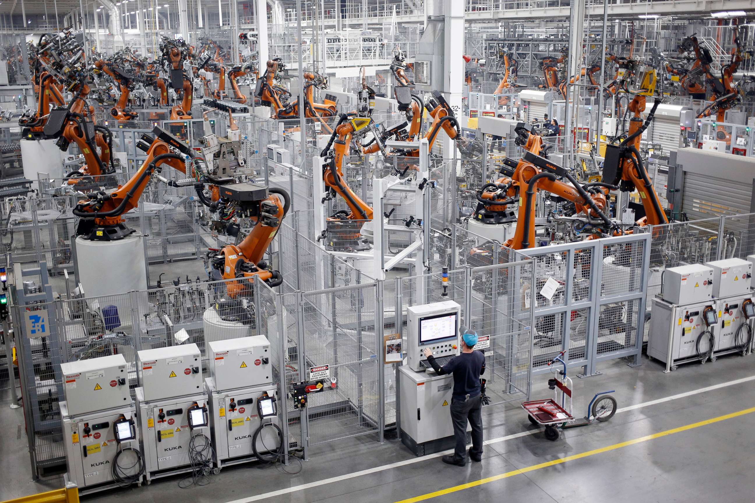 PHOTO: Robots weld car body components for vehicles at a BMW assembly plant in Greer, S.C., May 10, 2018.