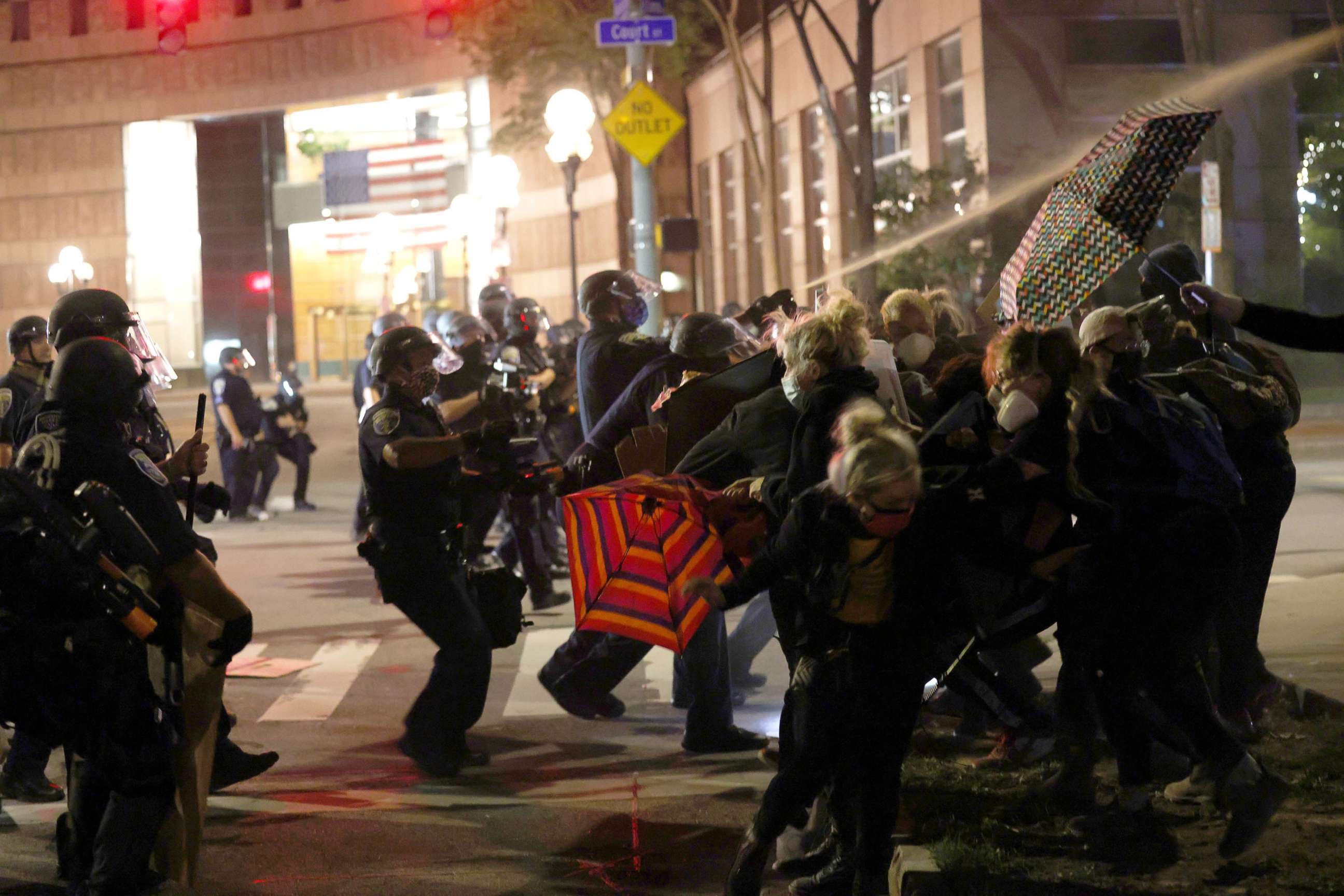 PHOTO: Police officers clash with demonstrators as they attempt to clear the streets after a march for Daniel Prude on Sept. 04, 2020, in Rochester, NY.