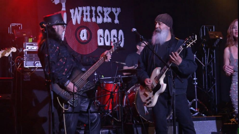PHOTO: Rock and Roll Fantasy Camp member Jeff Cates jams with Kim Thayil.