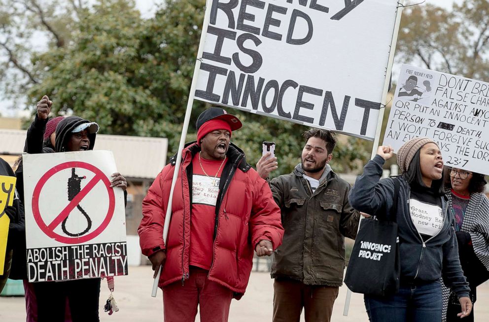 PHOTO: People chant along a street during a protest against the execution of Rodney Reed on Wednesday, Nov. 13, 2019, in Bastrop, Texas.