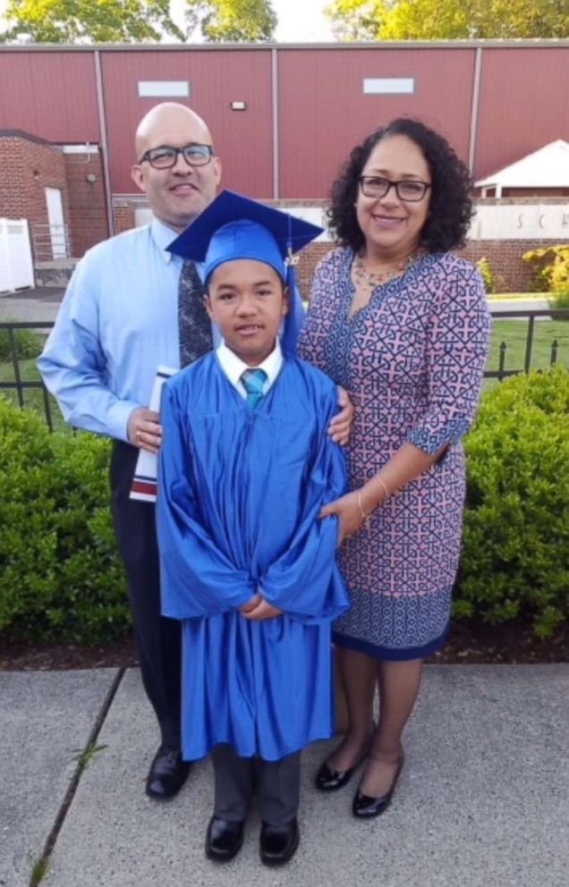 PHOTO: Santiago Rodriguez is pictured with his parents, Diana Cortes and Julian Rodriguez, at a school graduation ceremony.