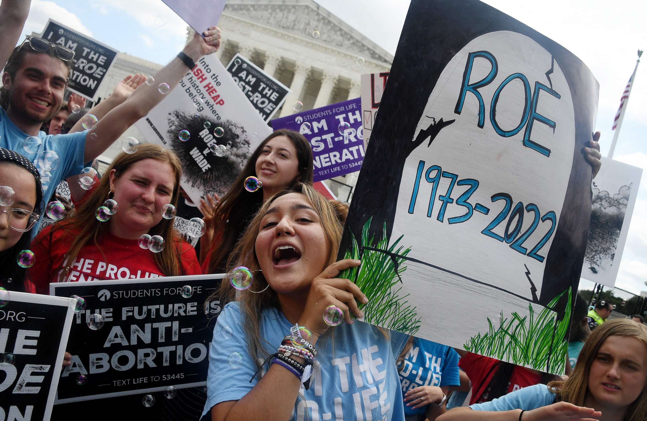 PHOTO: In this June 24, 2022, file photo, anti-abortion campaigners celebrate outside the Supreme Court.