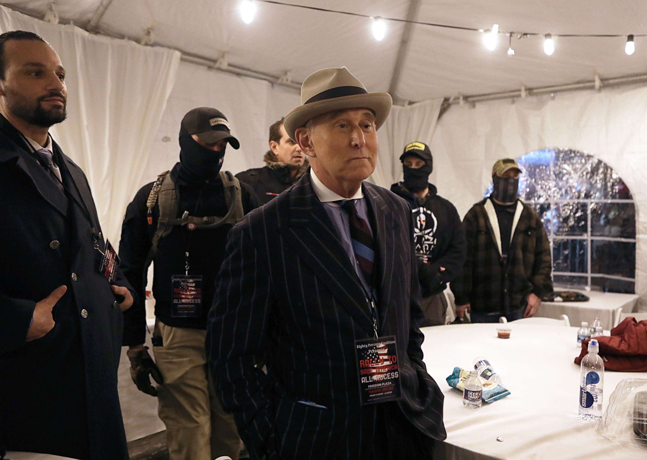 PHOTO: Roger Stone, former adviser to President Donald Trump, is flanked by security during a rally at Freedom Plaza, ahead of the U.S. Congress certification of the November 2020 election results, during protests in Washington, D.C., Jan. 5, 2021.