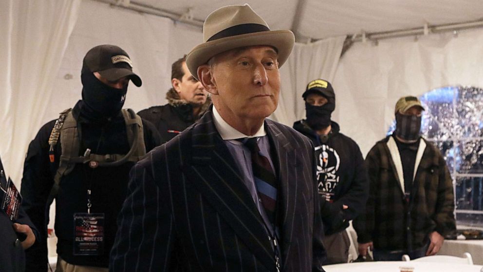 PHOTO: Roger Stone, former adviser to President Donald Trump, is flanked by security during a rally at Freedom Plaza, ahead of the U.S. Congress certification of the November 2020 election results, during protests in Washington, D.C., Jan. 5, 2021.