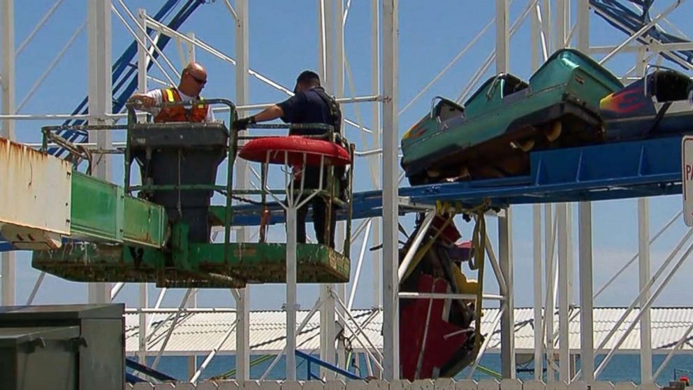 PHOTO: Officials inspect the sandblaster roller coaster at Daytona Beach's boardwalk.