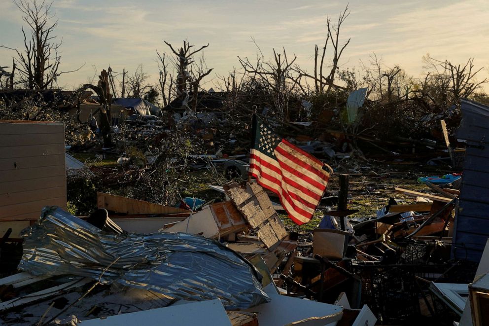 PHOTO: An American flag sits amidst the wreckage of a home after thunderstorms spawning high straight-line winds and tornadoes ripped across the state in Rolling Fork, Miss., March 27, 2023.
