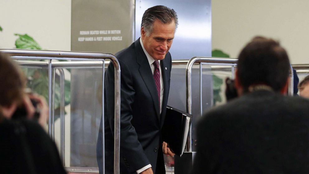 PHOTO: Sen. Mitt Romney departs the Senate subway upon arrival to the Capitol for the Senate impeachment trial on Jan, 28, 2020 in Washington, D.C.