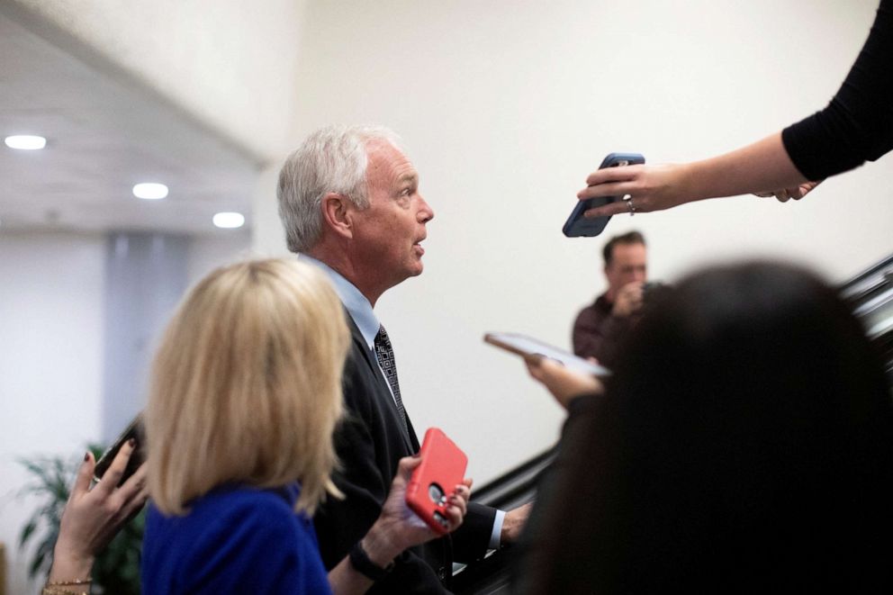 PHOTO: Sen. Ron Johnson speaks to journalists while walking to the Senate Floor during a vote on Capitol Hill in Washington, Sept. 8, 2022.