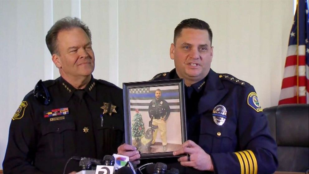 PHOTO: Newman, California Police Chief Randy Richardson holds up a photo of Cpl. Ronil Singh as Stanislaus County Sheriff Adam Christianson stands next to him during a press conference on Dec. 27, 2018.