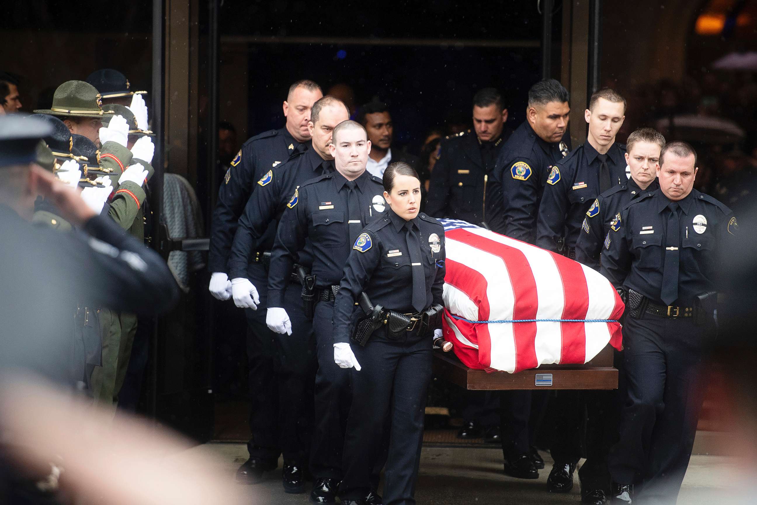 PHOTO: Newman police officers carry the body of their slain colleague Cpl. Ronil "Ron" Singh during his funeral on Jan. 5, 2019, in Modesto, Calif.